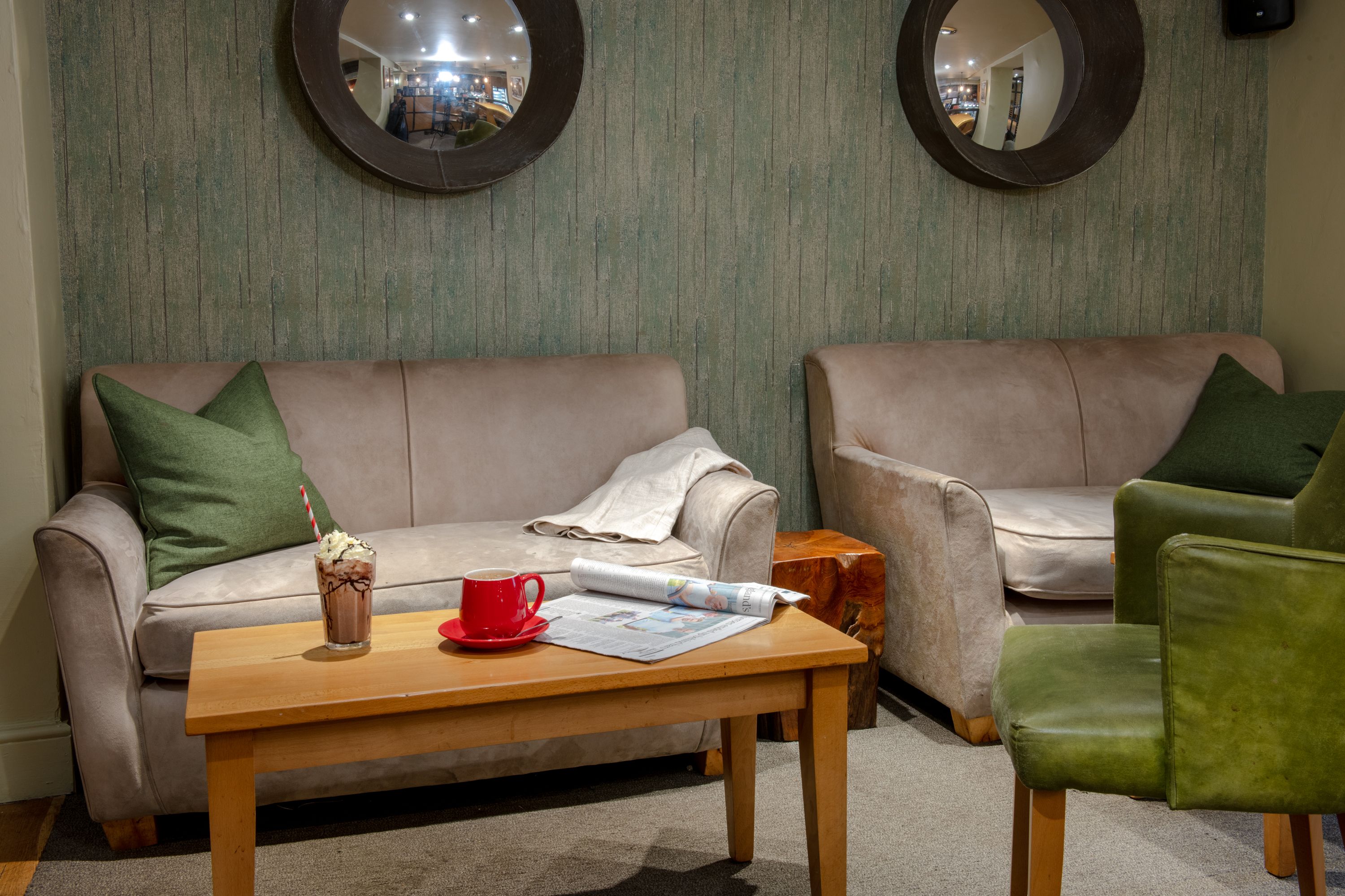 Sofa seating area of The Black Sheep