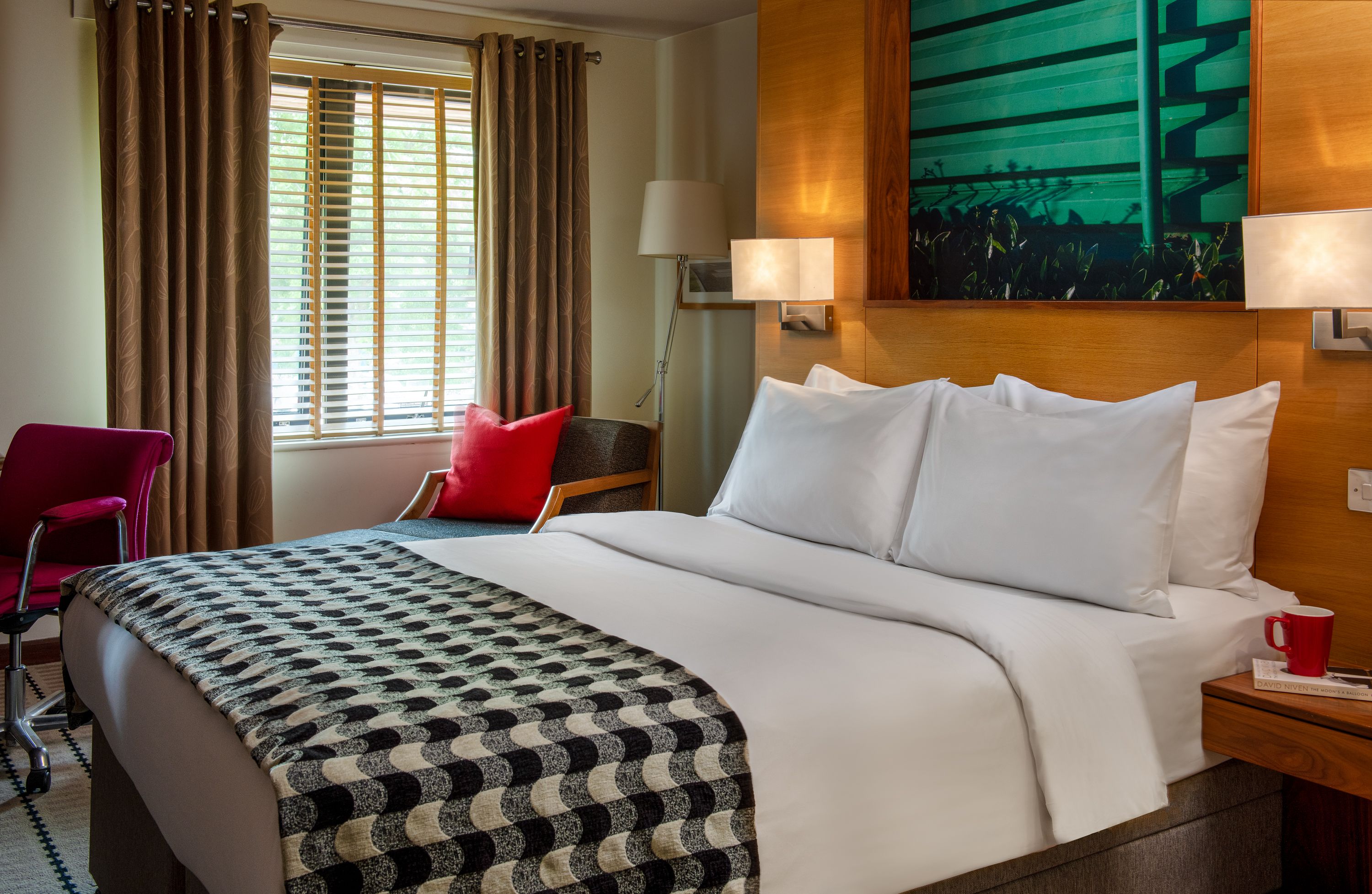 Close up of Lodge bed with patterned runner